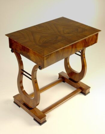 An elegant Biedermeier lyre-shaped occasional table