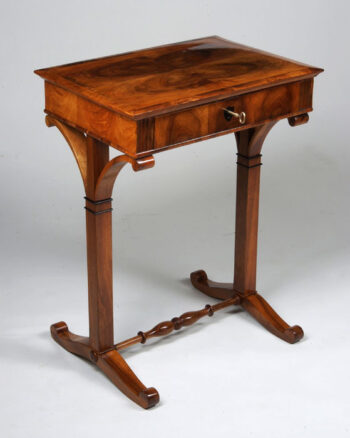 A handsome Biedermeier single drawer occasional table