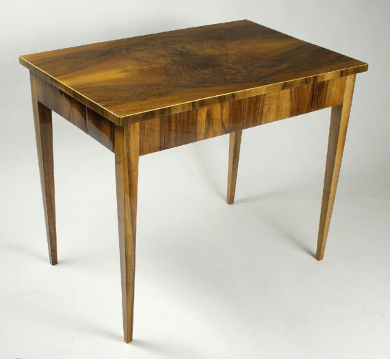 A Biedermeier gaming table with four drawers