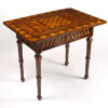 An unusual Neoclassical games table with inlaid chess- and backgammon-boards on a spin-plate