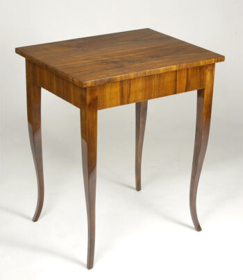 A Biedermeier occasional / sofa table with one drawer