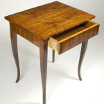 A Biedermeier occasional / sofa table with one drawer
