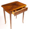 A Biedermeier occasional table with one drawer