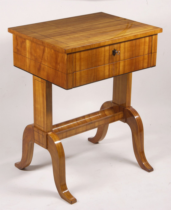 An elegant Biedermeier two drawer occasional table