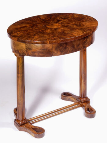 An elegant and moderne Biedermeier single drawer occasional table