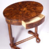 An elegant and moderne Biedermeier single drawer occasional table