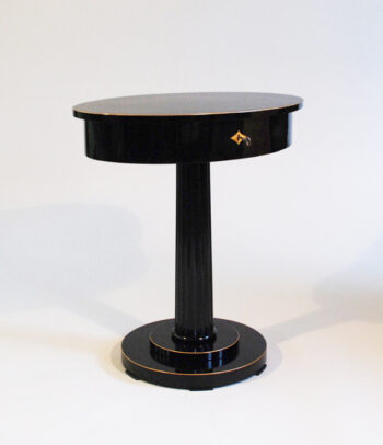 An elegant single drawer Biedermeier occasional table
