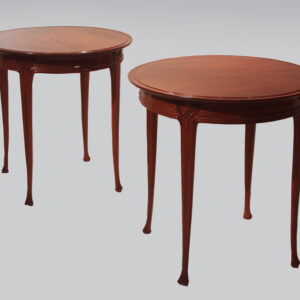 A pair of elegant French Art Nouveau end tables
