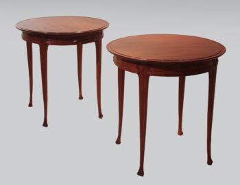 A pair of elegant French Art Nouveau end tables