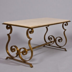 An elegant French 40's coffee table attributed to Raymond Subes