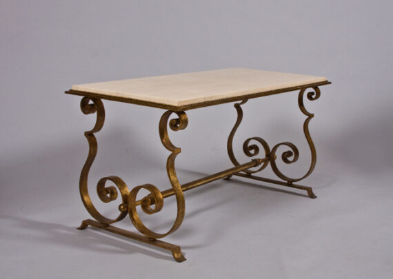 An elegant French 40's coffee table attributed to Raymond Subes