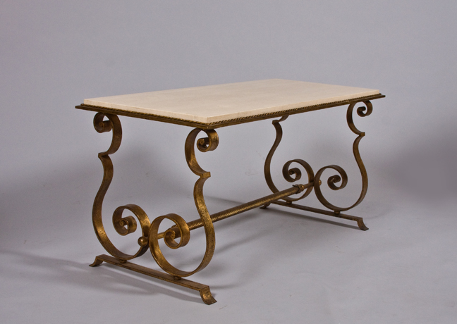 An elegant French 40's coffee table attributed to Raymond Subes