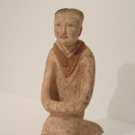 A pair of Han kneeling female figures