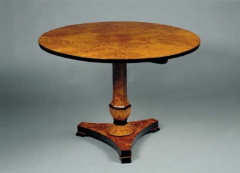 A Biedermeier pedestal tilt-top dining table