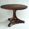 A rare Biedermeier tilt-top pedestal table