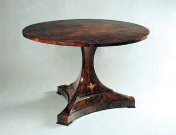 A rare Biedermeier tilt-top pedestal table
