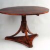 A Biedermeier tilt-top pedestal table