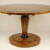 A Biedermeier tilt-top pedestal table