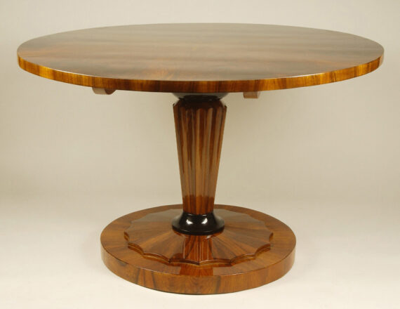 A Biedermeier tilt-top pedestal table
