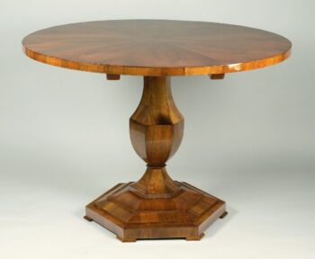 A Biedermeier tilt-top pedestal table