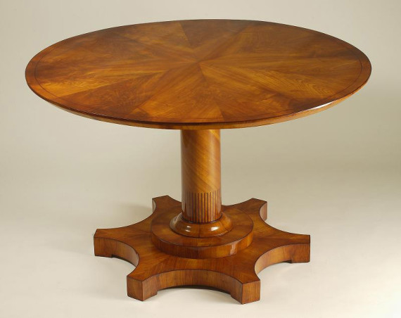 An unusual Biedermeier tilt-top pedestal table