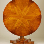 An unusual Biedermeier tilt-top pedestal table