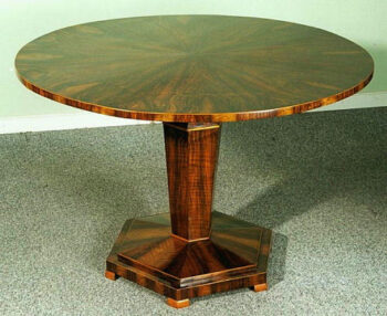 A fine and geometric Biedermeier tilt-top pedestal table