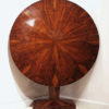 A fine and geometric Biedermeier tilt-top pedestal table