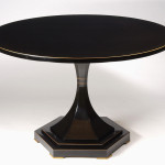 An elegant Biedermeier trumpet-shaped tilt-top pedestal table