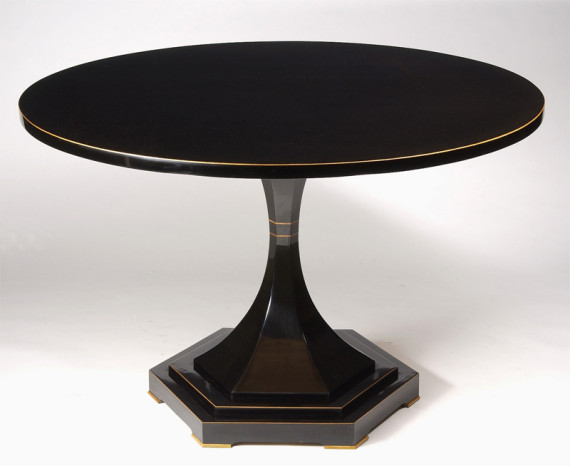 An elegant Biedermeier trumpet-shaped tilt-top pedestal table