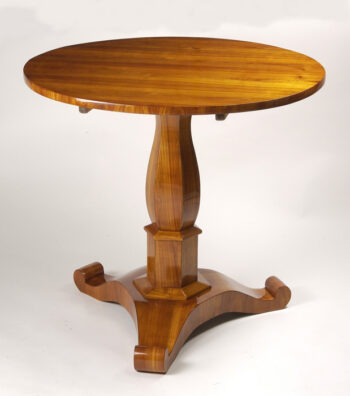A small Biedermeier tilt-top pedestal table