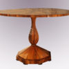 A Biedermeier tilt-top pedestal table