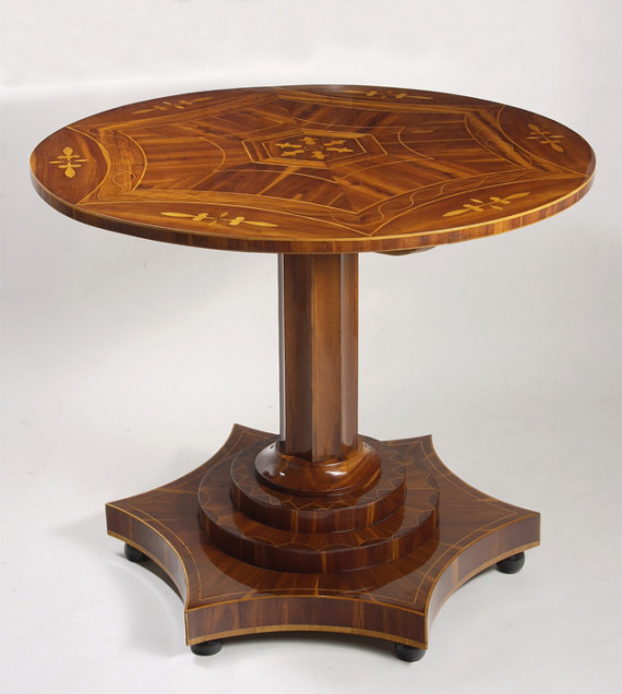 A small and unusual Biedermeier pedestal table