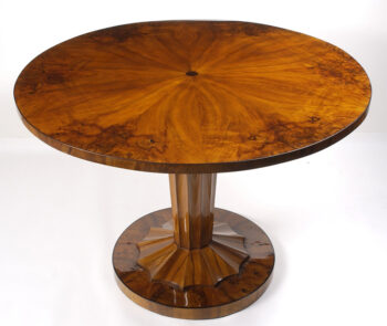 An elegant Biedermeier tilt-top pedestal table