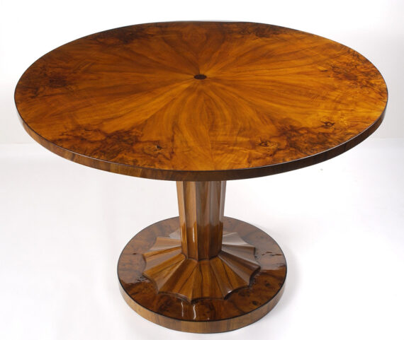 An elegant Biedermeier tilt-top pedestal table