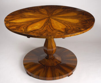 An elegant Biedermeier tilt-top pedestal table