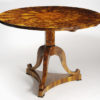 A Biedermeier tilt-top pedestal table