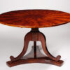 A large Biedermeier tilt-top pedestal table