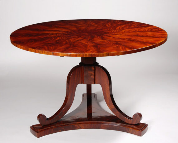 A large Biedermeier tilt-top pedestal table