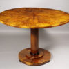 A Biedermeier tilt-top pedestal table