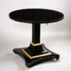 A small Empire tilt-top pedestal table