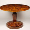 An elegant  Biedermeier tilt-top pedestal table