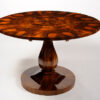 An elegant Biedermeier tilt top pedestal table