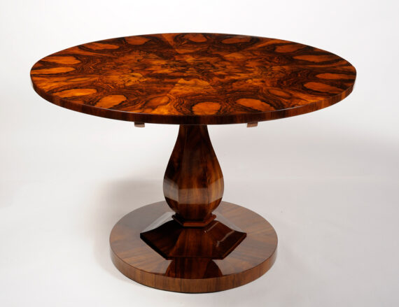 An elegant Biedermeier tilt top pedestal table