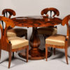 An elegant Biedermeier tilt top pedestal table