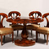 An elegant Biedermeier tilt top pedestal table