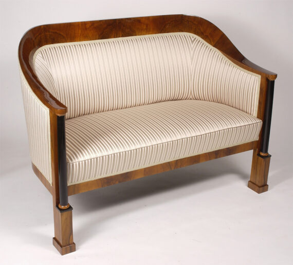 A petite Biedermeier elliptical sofa