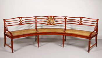 An unusual demi-lune Neoclassical revival library bench