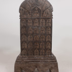 A large Buddhist carved black limestone stele