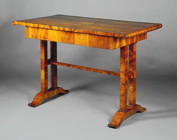 A Biedermeier single drawer writing table